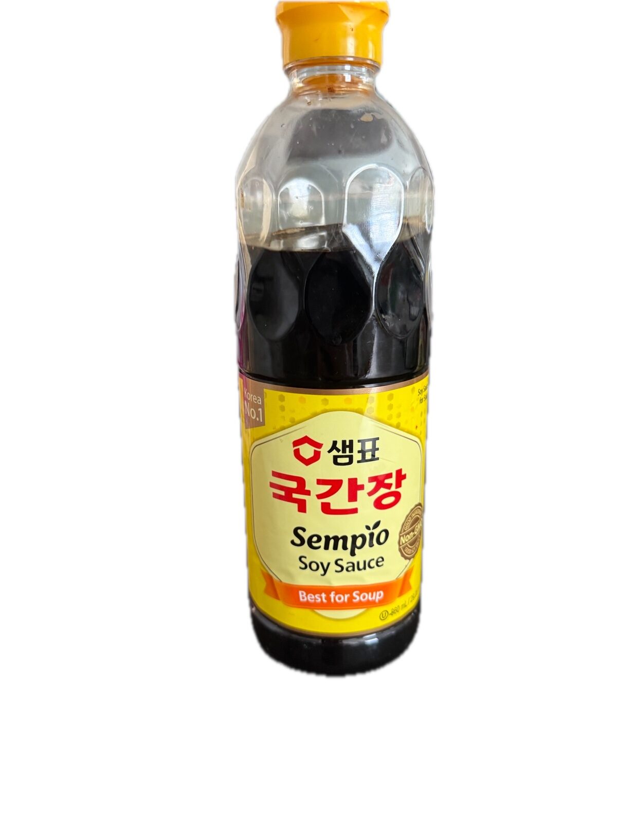 A bottle of Sempio guk-ganjang, Korean soup soy sauce, with a yellow label reading 국간장 and the words Best for Soup